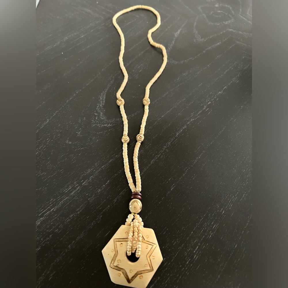 Wooden beaded necklace with hanging wood embellishment featherweight
